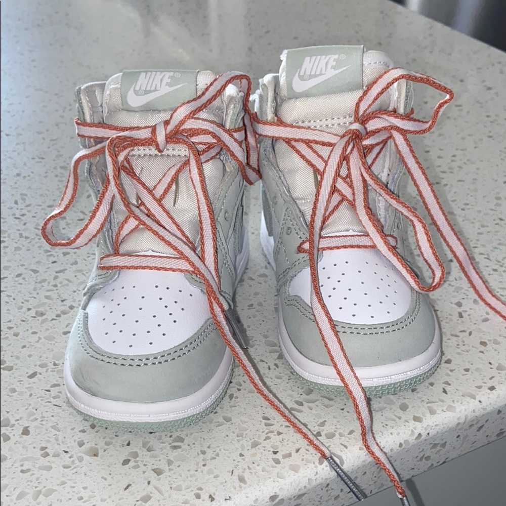Nike High-Top Sneakers with Orange Laces